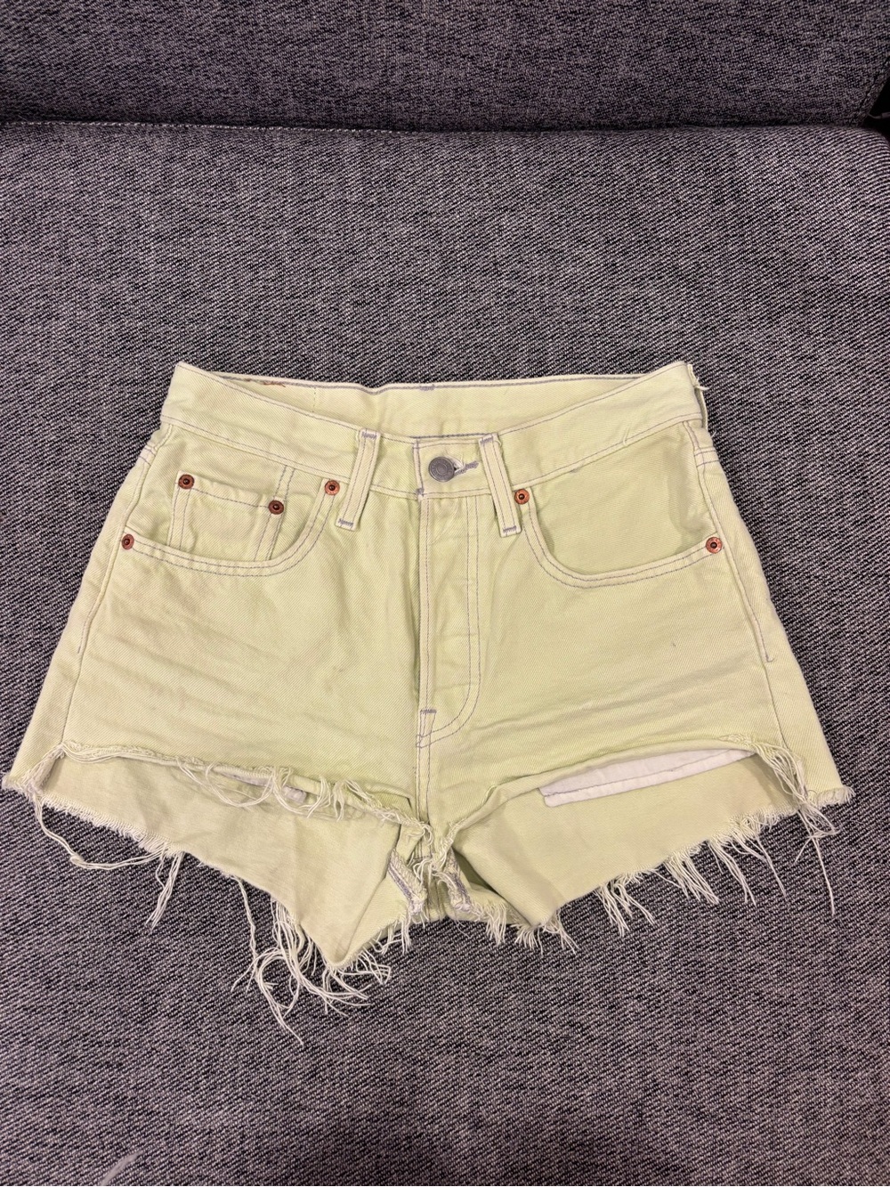 Levi's Pale Yellow Distressed Denim Shorts